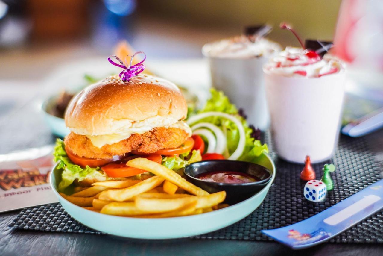 Furamaxclusive Ocean Beach Seminyak Bali Legian Eksteriør billede A burger with fries and a milkshake